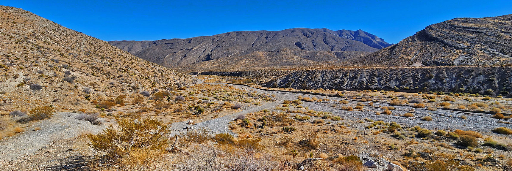 harris-springs-canyon-ridgeline-nevada-02-10-2025-006 Descend into Canyon Wash. NW Vegas is Just Beyond Ridgeline | Harris Springs Canyon Ridgeline | La Madre Mountains Wilderness, Nevada