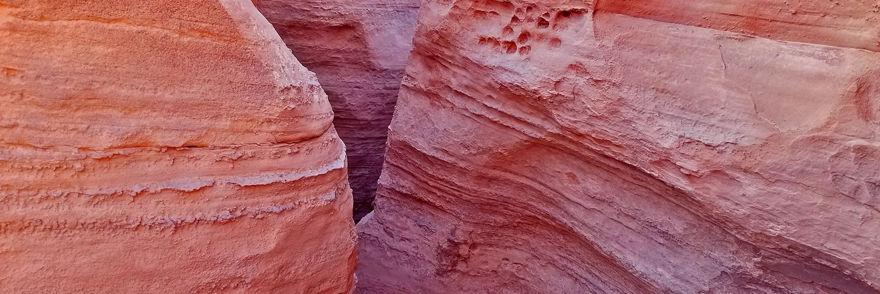 Try Squeezing Through This Openingon Natural Arches Trail, Valley of Fire State Park, Nevada