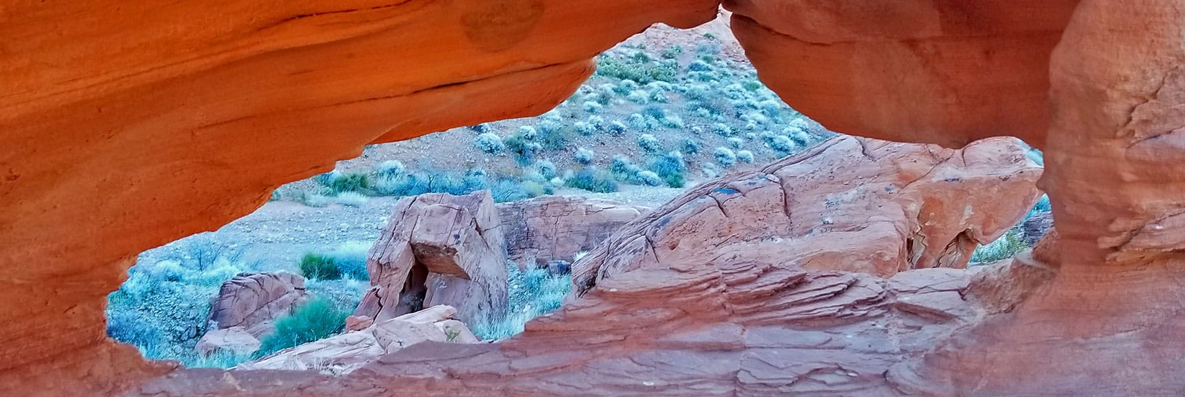 Window in the Rock Frames the Upper Canyon on Prospect Trail in Valley of Fire State Park, Nevada