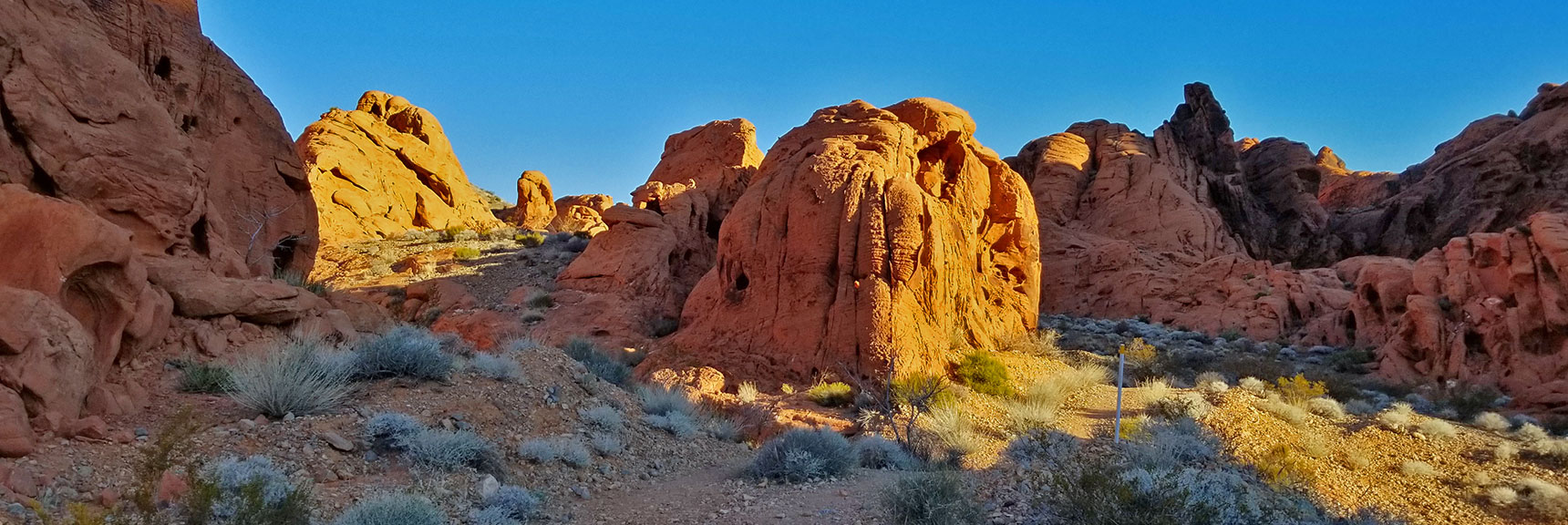 Moving Through the Upper Pass at Sunrise on Prospect Trail in Valley of Fire State Park, Nevada