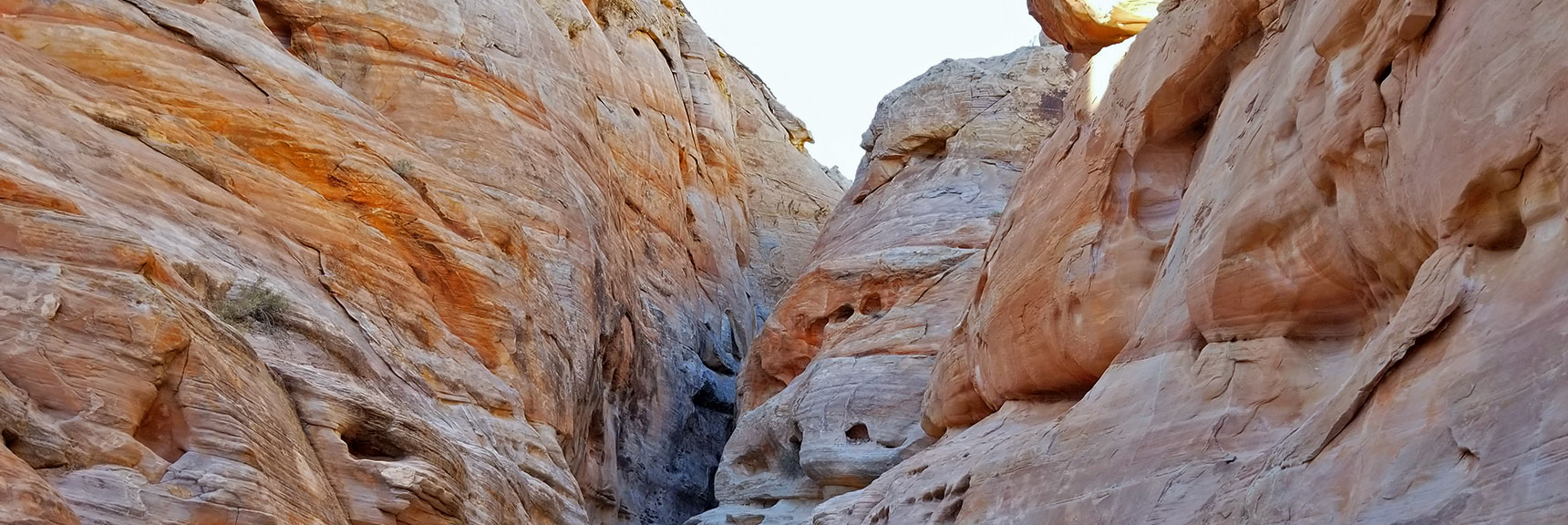 Passing Through the Slot Canyon on White Domes Loop Trail in Valley of Fire State Park, Nevada