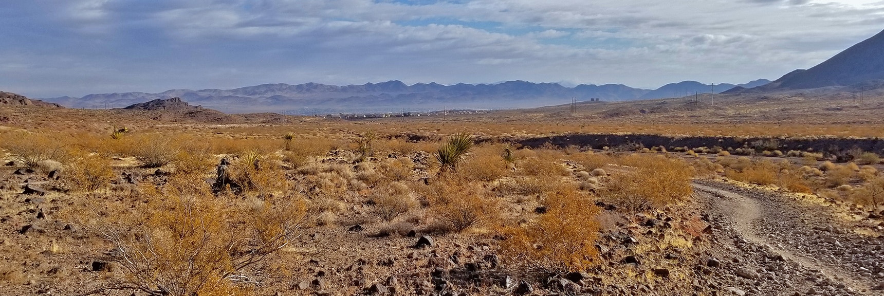 Higher View Back Toward Henderson. Lake Mead Beyond the Far Hills| McCullough Hills Trail in Sloan Canyon National Conservation Area, Nevada