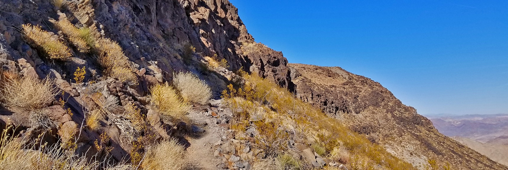 Skirting the Base of Fortification Hill Head Wall. | Fortification Hill | Lake Mead National Recreation Area, Arizona