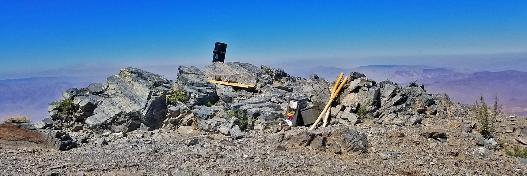 Arrival on Telescope Peak True Summit. Black Telescope on Summit Rocks | Telescope Peak Summit from Wildrose Charcoal Kilns Parking Area, Panamint Mountains, Death Valley National Park, California