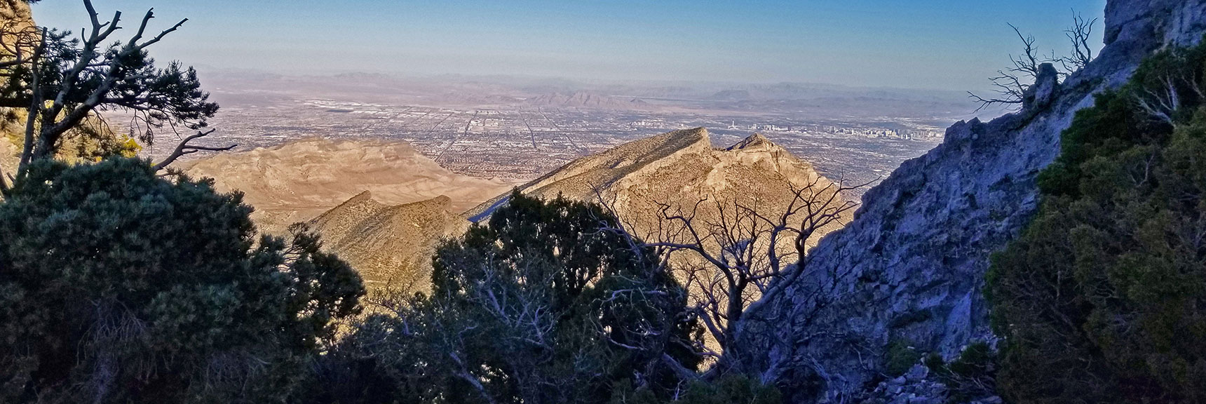Damsel Peak and Las Vegas Valley from Notch Between La Madre and El Padre Mts | La Madre Mountain,, El Padre Mountain, Burnt Peak | La Madre Mountains Wilderness, Nevada