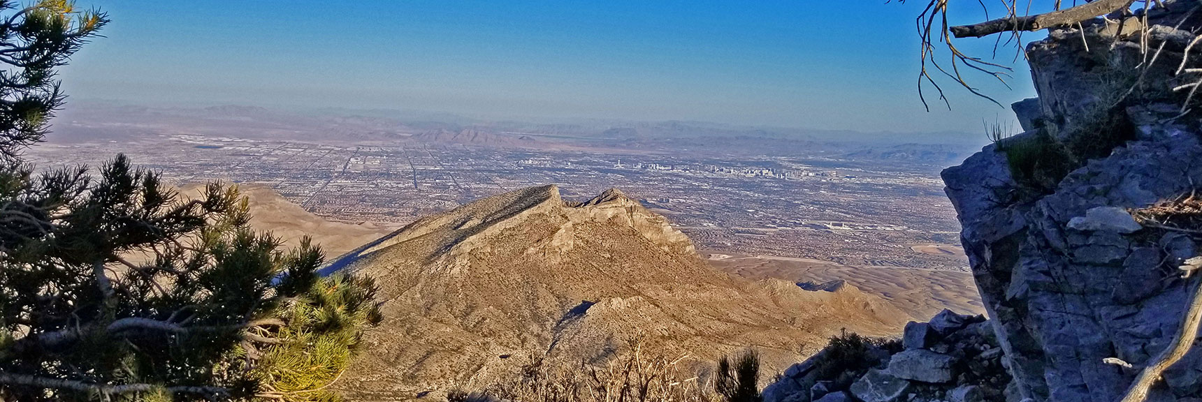 Damsel Peak and Las Vegas Valley from Notch Between La Madre and El Padre Mts | La Madre Mountain,, El Padre Mountain, Burnt Peak | La Madre Mountains Wilderness, Nevada