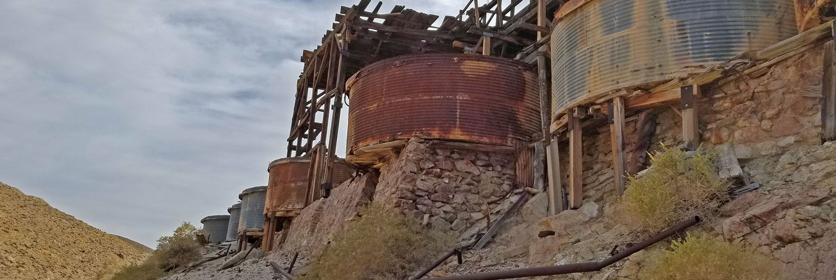 Nine Large Cyanide Tanks, Final Process to Dissolve Crushed Ore to Extract Gold | Skidoo Stamp Mill, Panamint Mountains, Death Valley National Park, CA