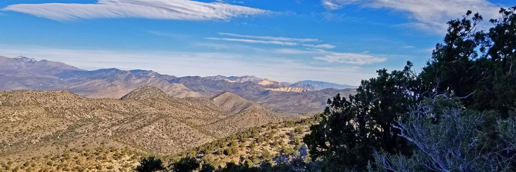 View Toward Mt. Charleston Wilderness, Rainbow Mts and La Madre Mts | Potosi Mountain Northern Cliffs Trail | Spring Mountains, Nevada