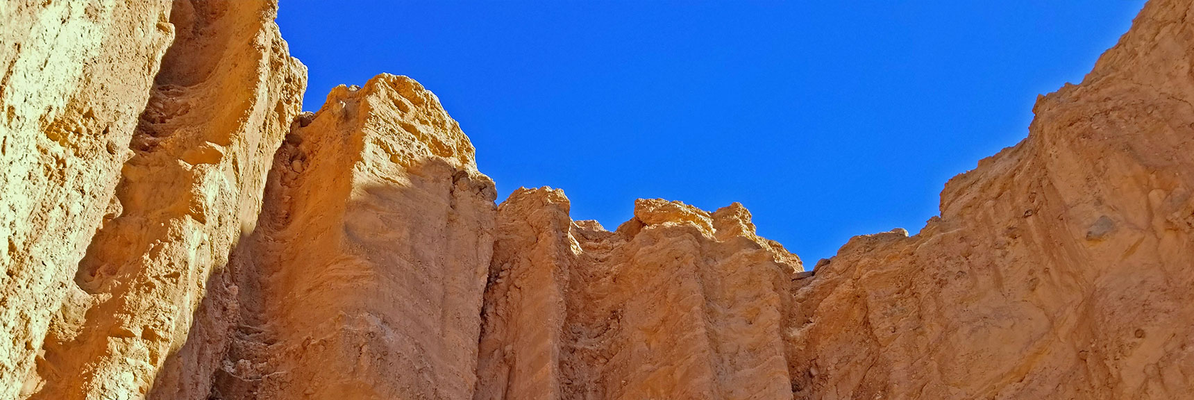 Spectacular Towering Cliff Walls at Red Cathedral, Upper End of Golden Canyon. | Golden Canyon to Zabriskie Point | Death Valley National Park, California