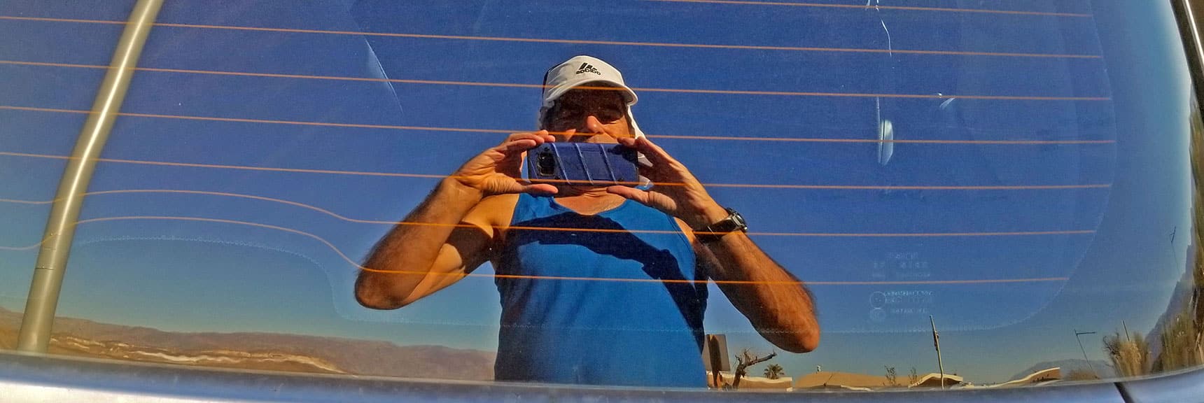 Myself Mirrored in The Beast's (Smart Car) Hatchback Window. | Tea House & Table Rock Circuit | Furnace Creek | Death Valley National Park, California