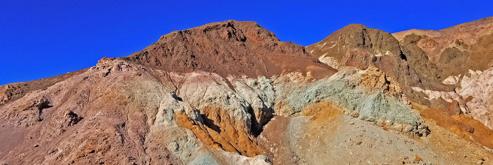 More Colorful Hills on Artist's Pallet: Reds (Iron, Hematite); Whites (Magnesium); Greens (Chlorite) | Artists Drive Hidden Canyon Hikes | Death Valley National Park, California
