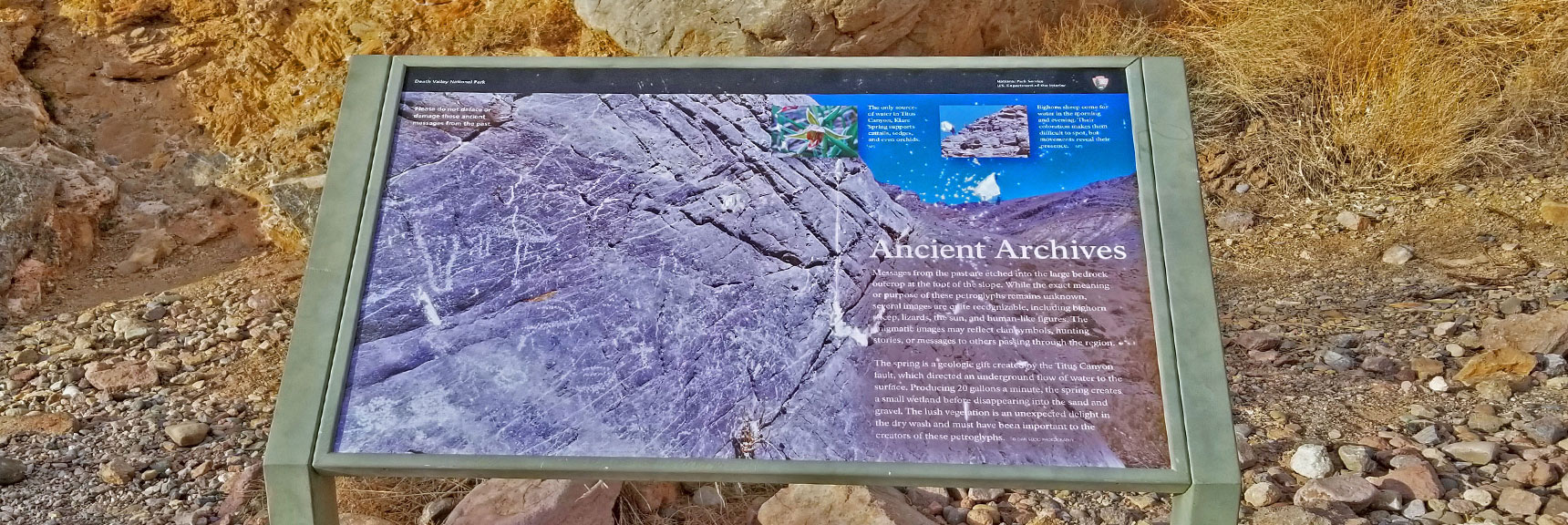 Interpretive Sign at Ancient Petroglyph Rocks. | Titus Canyon Grand Loop by Mountain Bike | Death Valley National Park, California