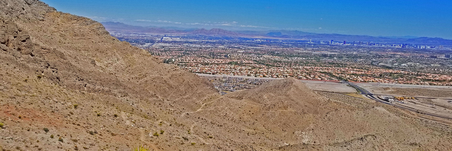 Final Stretch Back to Upper End of Lake Mead Blvd. Las Vegas Valley Background. | Little La Madre Mt, Little El Padre Mt, Little Burnt Peak | Near La Madre Mountains Wilderness, Nevada