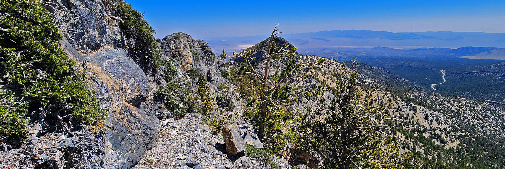 Ledges Continue Until Route Widens a Bit Beyond Height Ahead (left). North Sister (right). | Sisters South to the Sisters North | Mt. Charleston Wilderness | Spring Mountains, Nevada