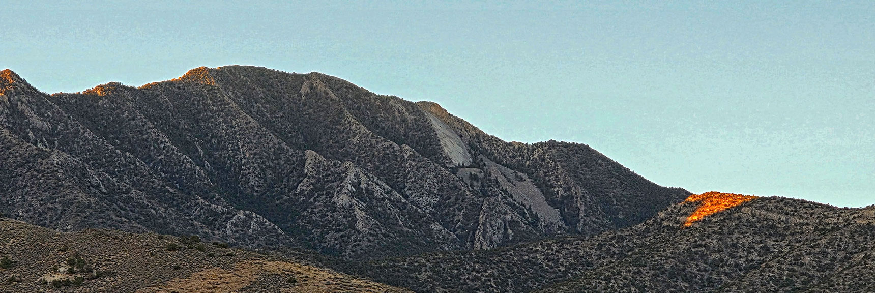 La Madre Mountain (left), Sunlit Ascent Point on North Ridge (right) | North Ridge Loop | La Madre Mountains Wilderness, Nevada
