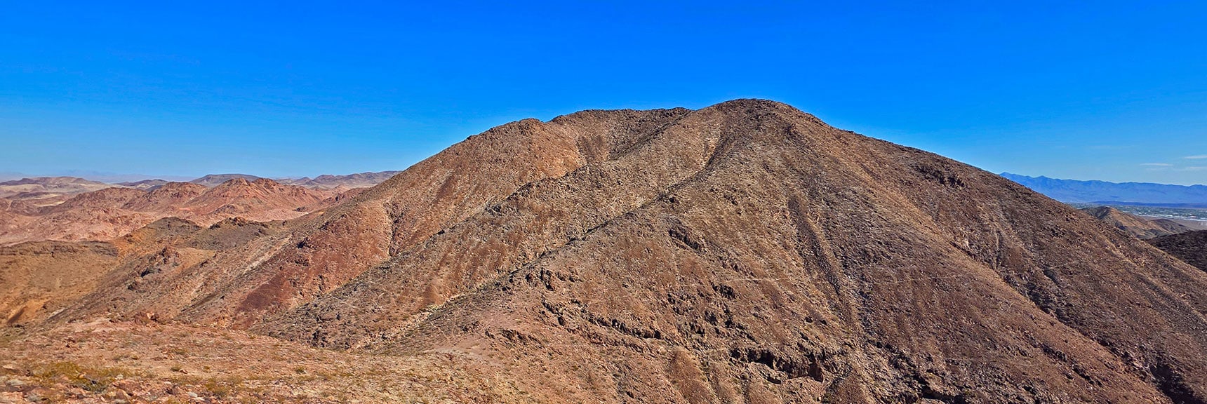 Next Peak is Leaning Arch Peak. Deep Saddle Down Steep Slope. | Leaning Arch Loop | River Mountains | Lake Mead NRA, Nevada