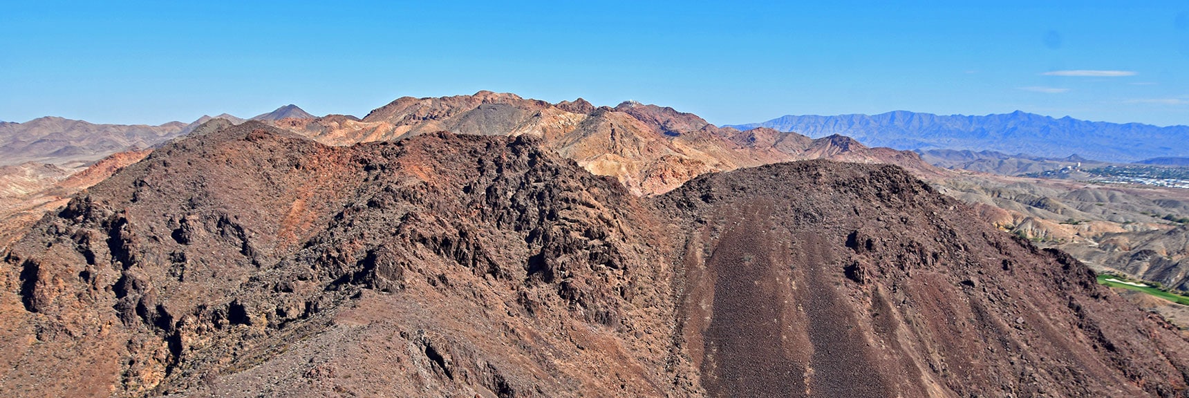 Leaning Arch is in the Rocky Area Near Base of Next Ascent Slope | Leaning Arch Loop | River Mountains | Lake Mead NRA, Nevada