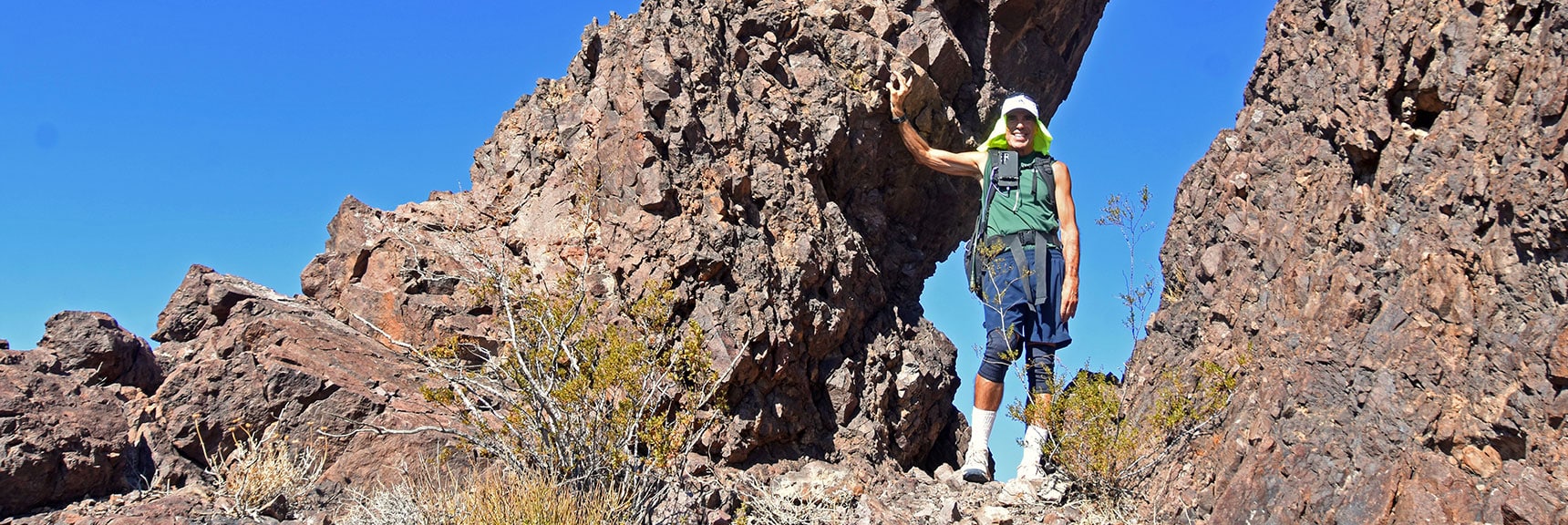 David Standing in Base of Leaning Arch | Leaning Arch Loop | River Mountains | Lake Mead NRA, Nevada