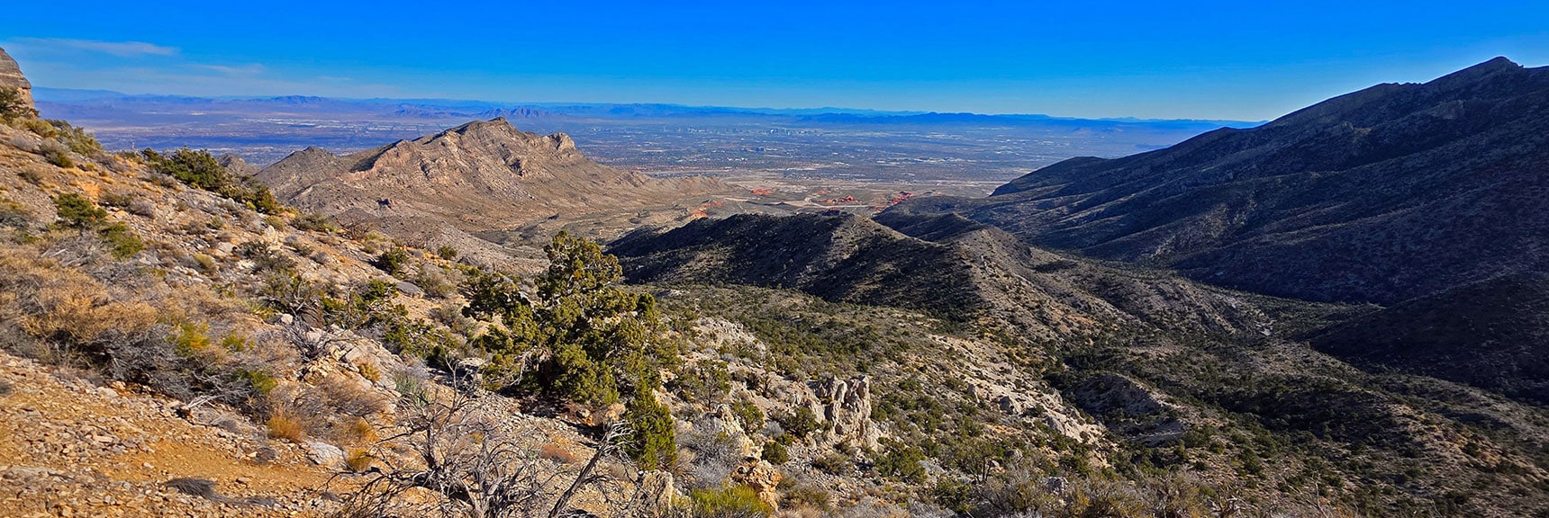 View Back to Gottlieb, Whale, Little Red Rock, Metro Vegas. | La Madre Ridge East Base Circuit | La Madre Mountains Wilderness, Nevada