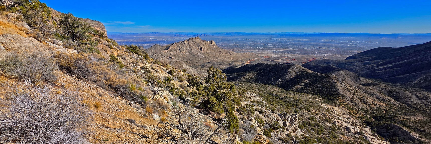 Loose Rock Incline Increasing Close to Cliff Base. | La Madre Ridge East Base Circuit | La Madre Mountains Wilderness, Nevada