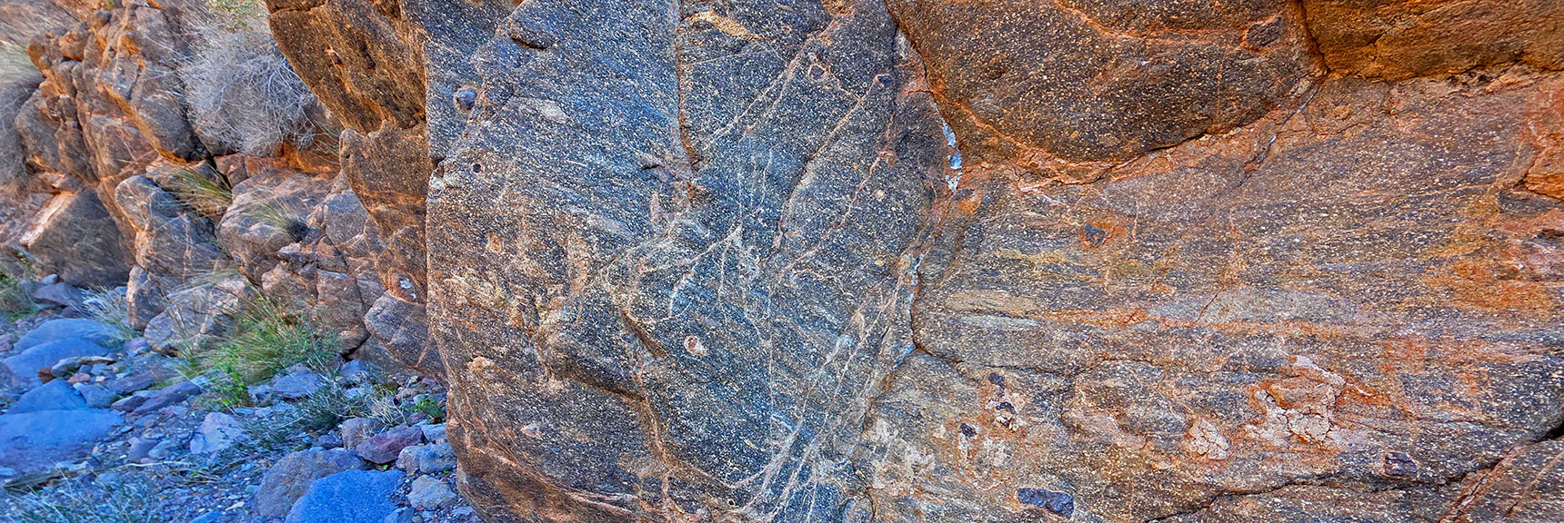Closer Examination Shows Cliffs Are Frozen Composite Volcanic Debris. | Lonesome Peak West Canyon Loop | Eldorado Wilderness, Nevada