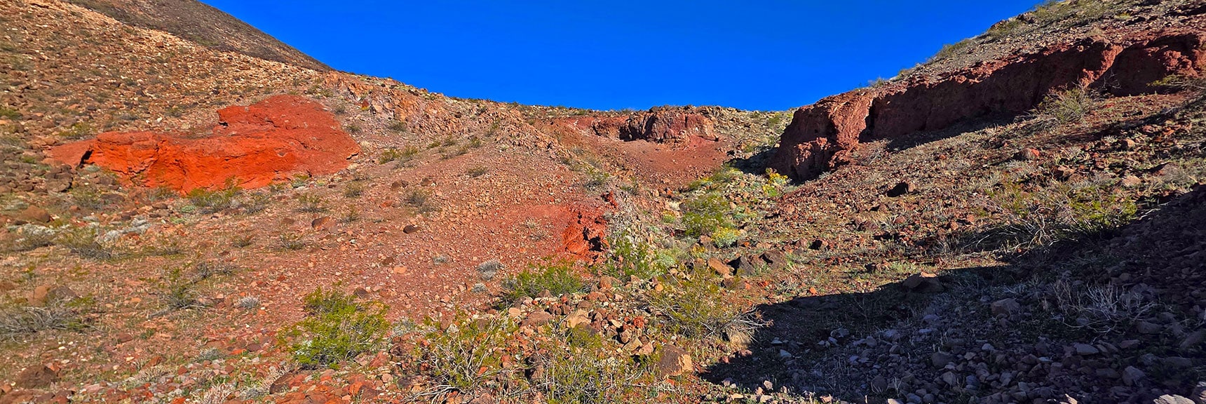 View Back Up Rocky Slope Entrance to Descent Gully. | Lonesome Wash to the Colorado River | Eldorado Wilderness, Nevada