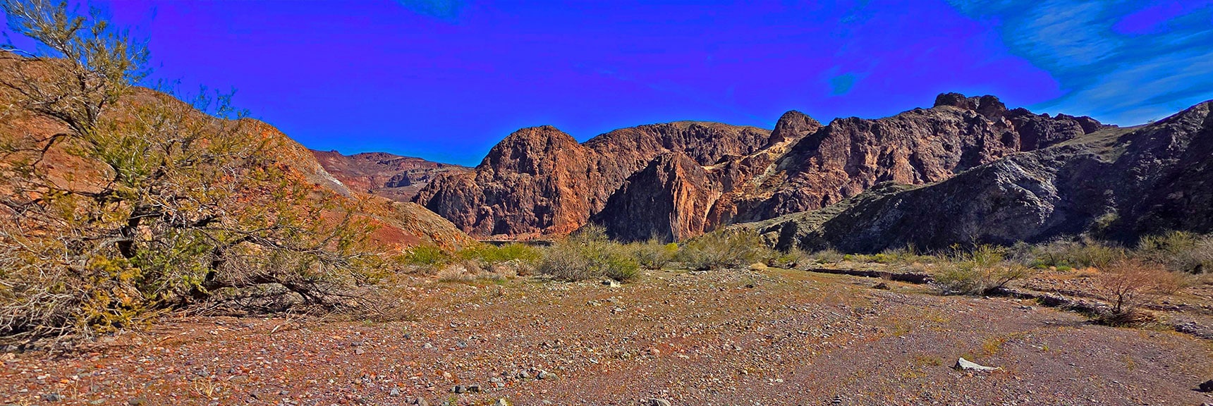 First View of Colorado River at Base of Arizona Cliffs. | Lonesome Wash to the Colorado River | Eldorado Wilderness, Nevada