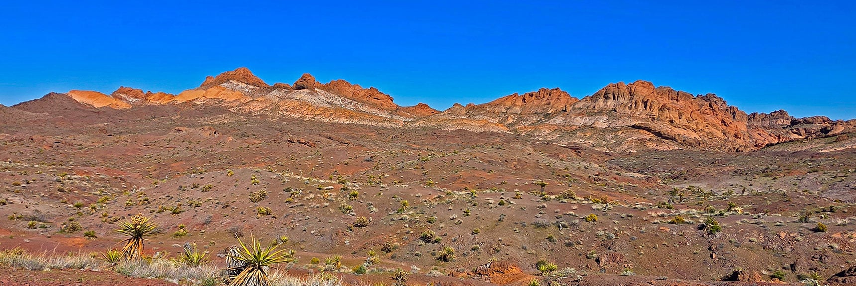 View Terrain from Ridge Above the Hwy: Approach Wash (right), Pigs in Zen Peak (left) | Murl Emery Arch | Eldorado Wilderness, Nevada