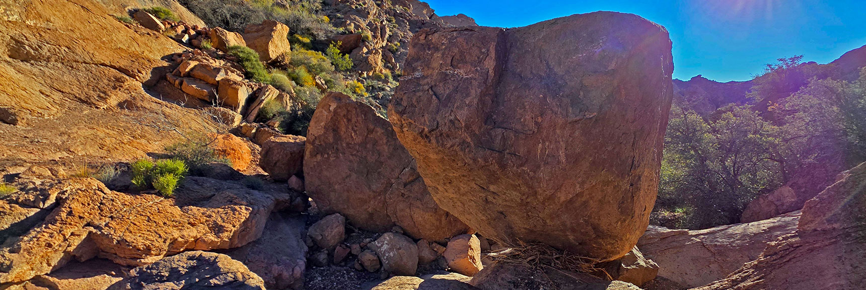 Trail Weaves Around Increasing Boulders in Narrows. | Murl Emery Arch | Eldorado Wilderness, Nevada