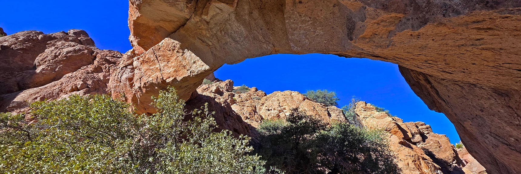 View Under the Huge Solid Span on East Side. | Murl Emery Arch | Eldorado Wilderness, Nevada