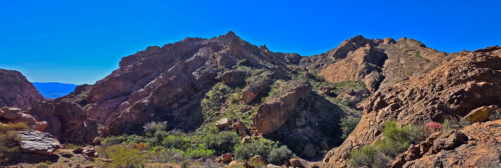 View Down and Across Wash While Approaching Arch Cave. | Murl Emery Arch | Eldorado Wilderness, Nevada