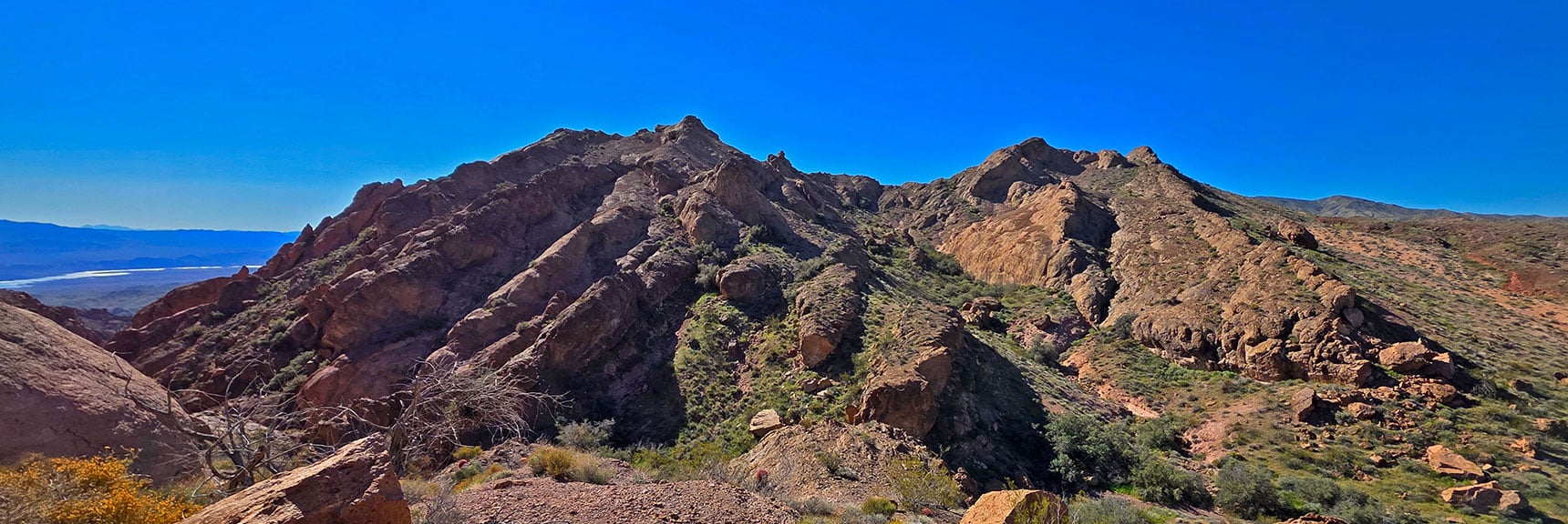 Hills to South Across Wash Ascend to Nelson Benchmark. | Murl Emery Arch | Eldorado Wilderness, Nevada