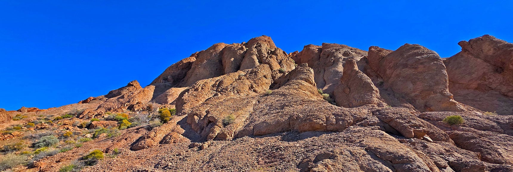 Skirt Base of Ridgetop Formations. | Murl Emery Arch | Eldorado Wilderness, Nevada