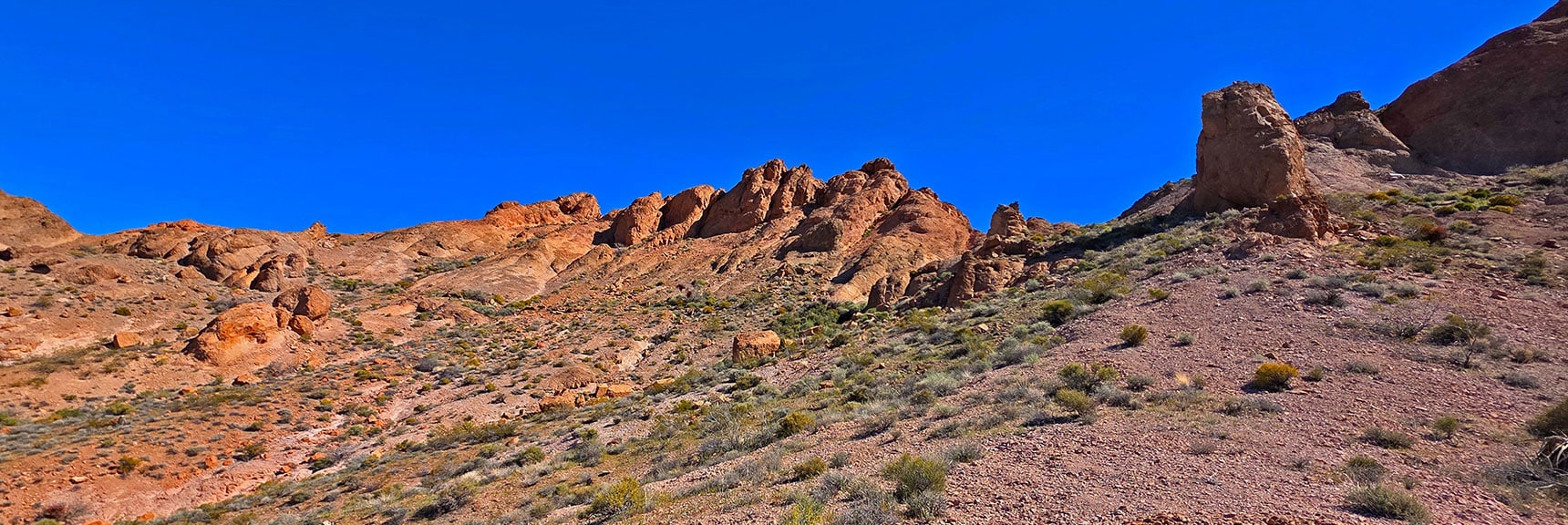 Continue Skirting Ridge, Circle Around Pillar Toward Stocker Pass | Murl Emery Arch | Eldorado Wilderness, Nevada