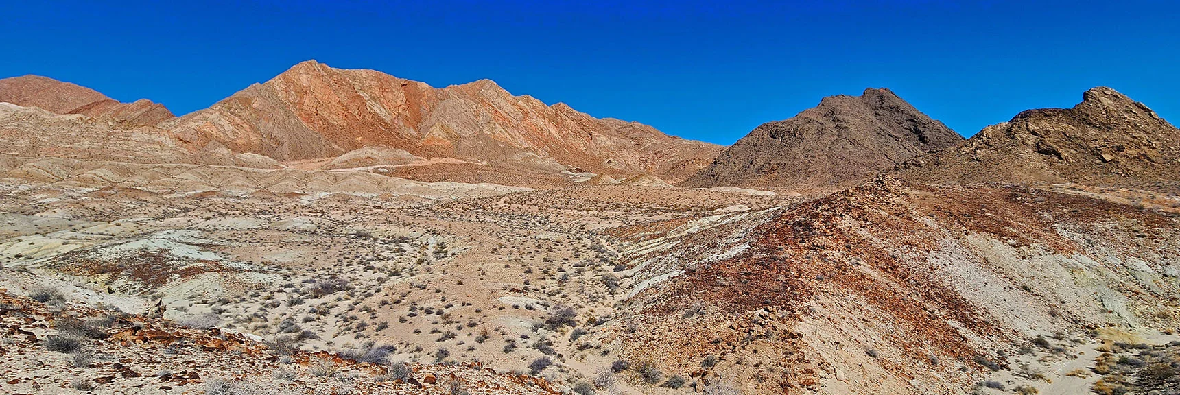 Aiming for Lighter Ridgeline Left of Dark Hills, Descend into Wash Ahead. | Anniversary Ridge | Muddy Mountains Wilderness, Nevada
