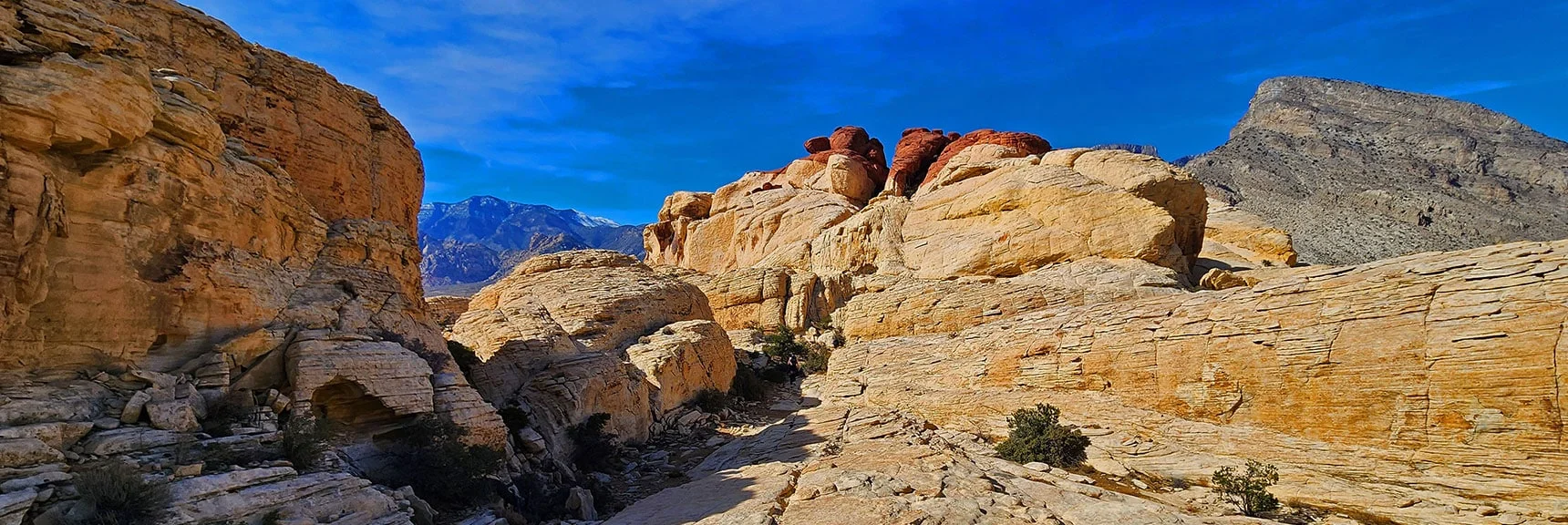 Red Cap Peak Ahead. Will Ascend Right Slot, Circle Behind, Take Left Slot to Summit | Red Cap Peak Summit | Red Rock Canyon NCA, Nevada