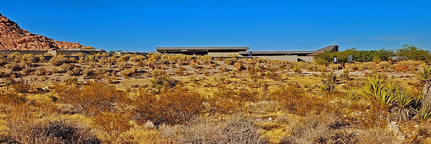 Passing Red Rock Canyon Visitor Center on Grand Circle Loop Trail. | La Madre Ridgeline Grand Crossing | La Madre Mountains Wilderness and Red Rock Canyon NCA, Nevada