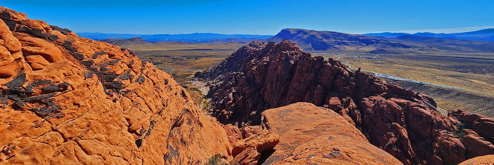 Arrival on Upper Ledge. Spectacular View South Across Red Rock Canyon | Calico Tanks from Guardian Angel Pass | Red Rock Canyon NCA, Nevada