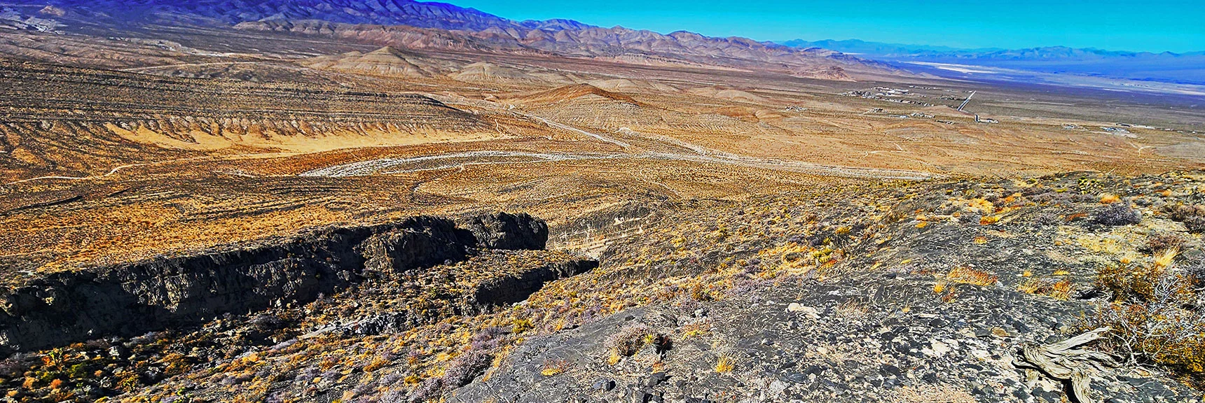 View Back Down Ridge Approach Slope. Rift Canyon & Entire Approach Route Below | Harris Springs Canyon Ridgeline | La Madre Mountains Wilderness, Nevada