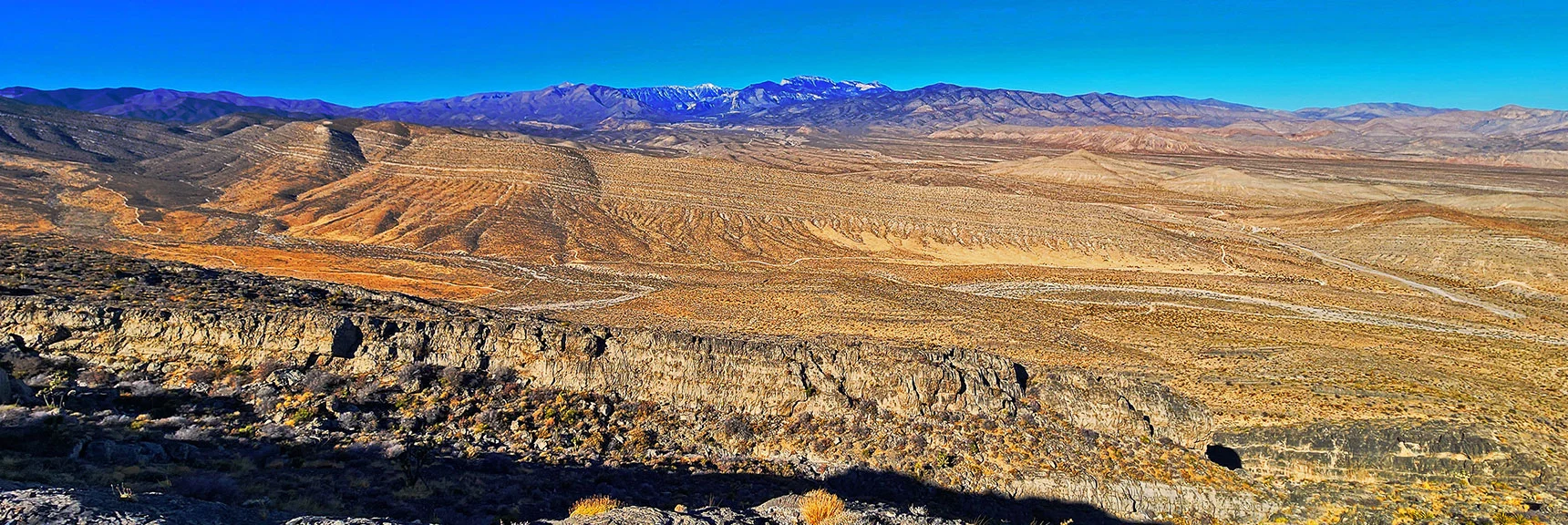 View West to Ever Expanding Charleston Wilderness. Entire Approach Route Below. | Harris Springs Canyon Ridgeline | La Madre Mountains Wilderness, Nevada