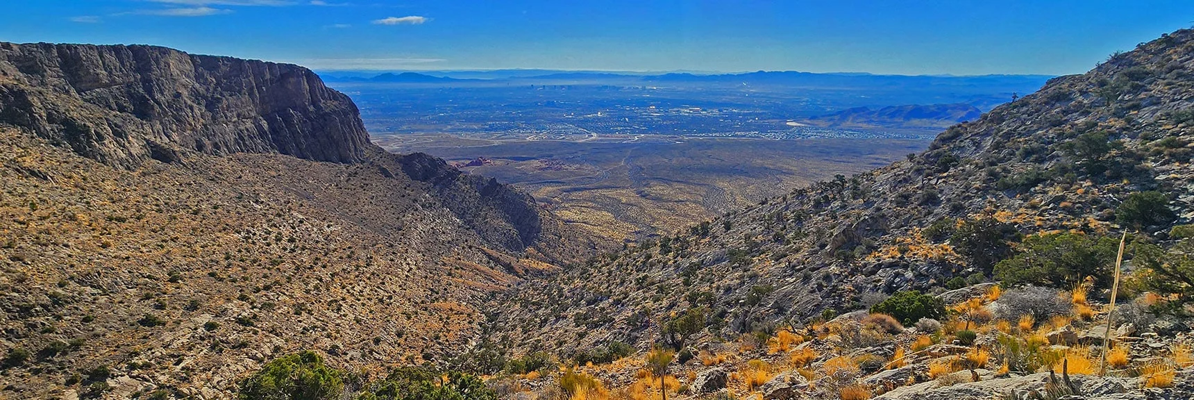 Vegas Valley Viewed Through Canyon Opening Below | Damsel Peak Southeastern Pinnacle Loop | La Madre Mountains Wilderness, Nevada
