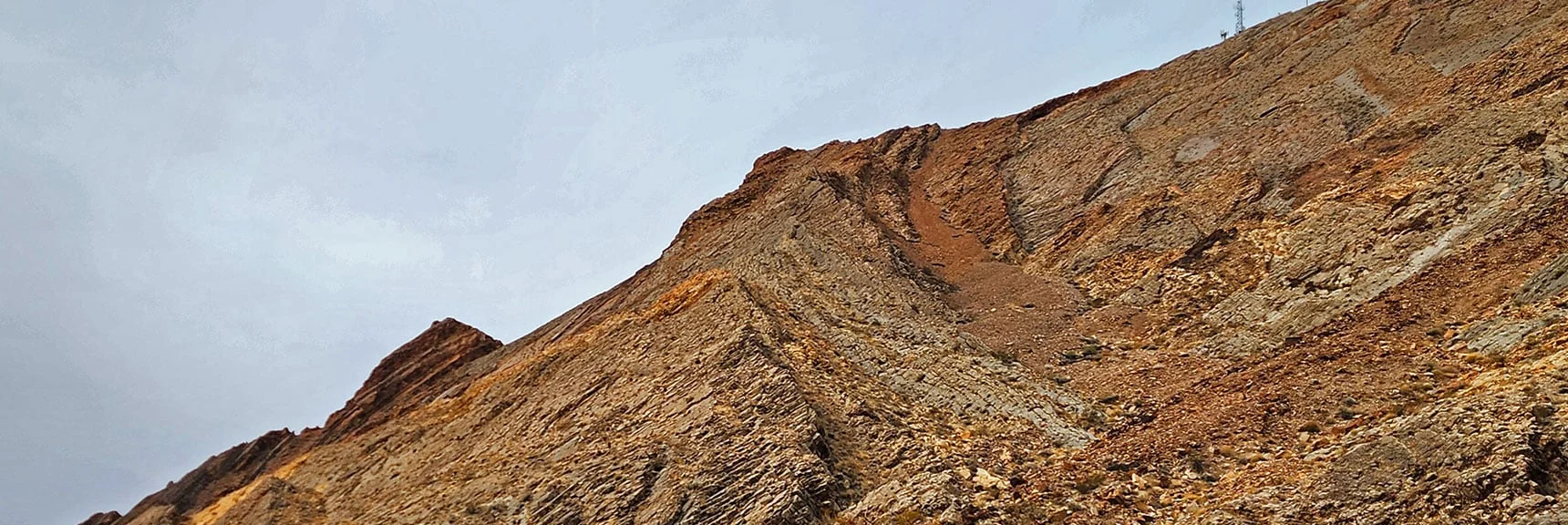 Here's the Ascent Slope. Will Summit Left of the Far South Tower. | Frenchman Mt East Approach Loop | Near Lake Mead National Recreation Area, Nevada