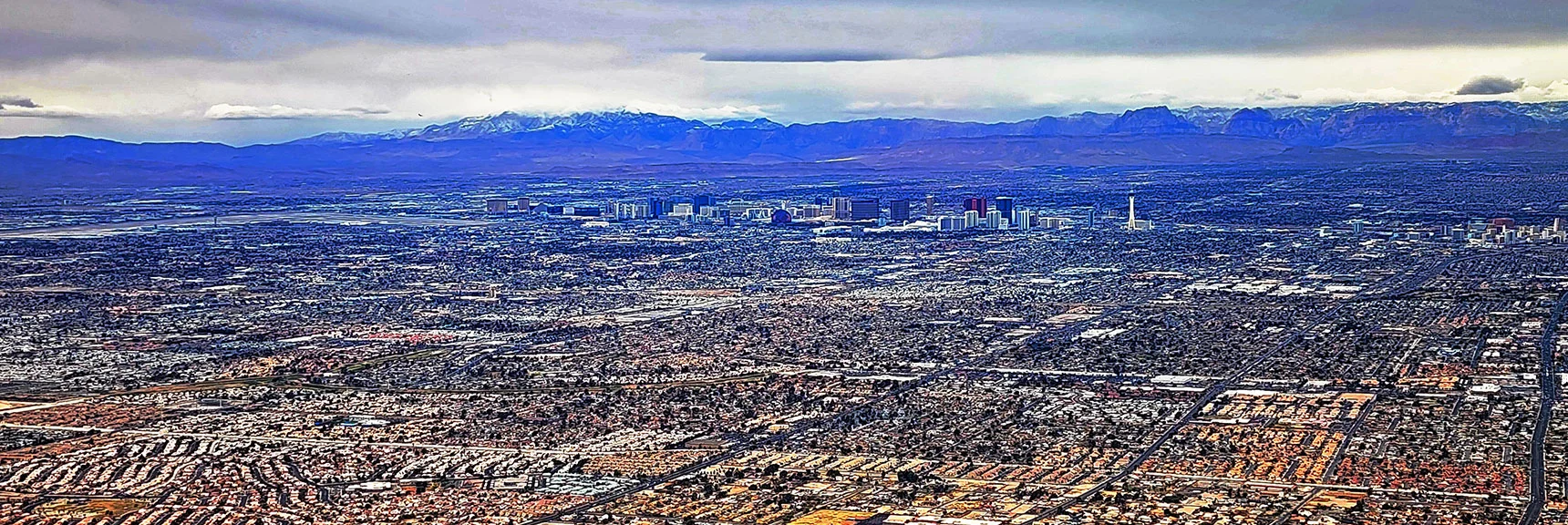 Zoom in on the Strip to the West. Nevada Mt. Wilson Behind Stratosphere | Frenchman Mt East Approach Loop | Near Lake Mead National Recreation Area, Nevada