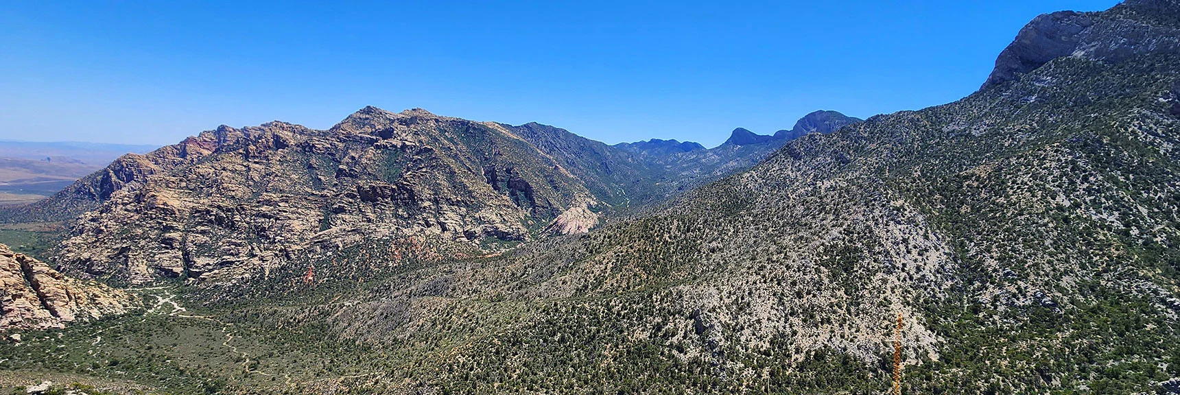 View West Along Rocky Gap Between Wilson Ridge (right) and Rainbow Mts. (left). | La Madre Springs West Ridge Loop | La Madre Mountains Wilderness, Nevada