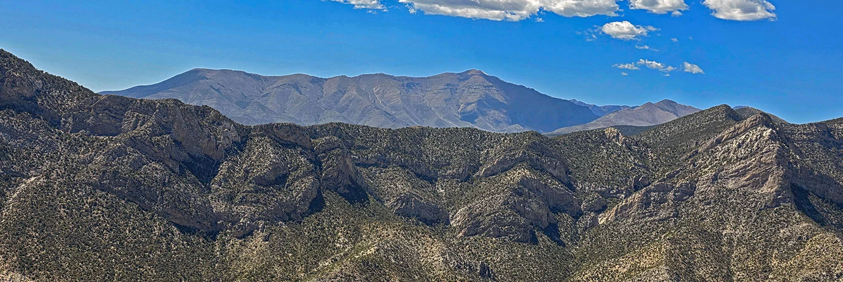 Blue Diamond Hill (R), Red Rock Canyon (Middle), Indecision Peak (L). | Monument Peak Summit | Rainbow Mountain Wilderness, Nevada