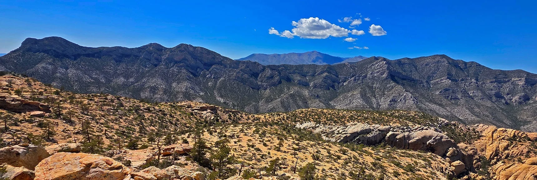 Blue Diamond Hill (R), Red Rock Canyon (Middle), Indecision Peak (L). | Monument Peak Summit | Rainbow Mountain Wilderness, Nevada
